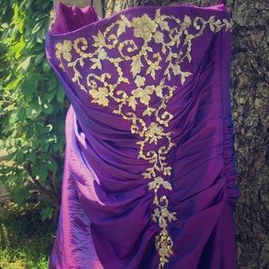 Purple and gold prom or formal dress.